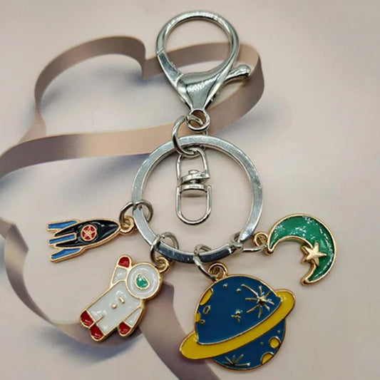 Escape the Land Keychain – Cute UFO & Astronaut Enamel Space Charm