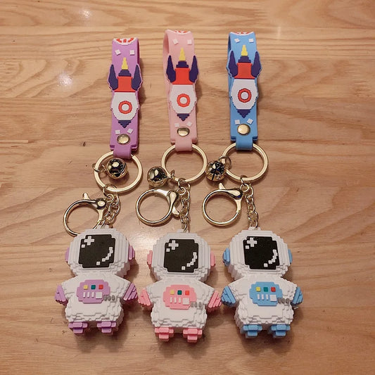 Cartoon Silicone Astronaut Keychain – Cute Spaceman & Rocket Bag Pendant