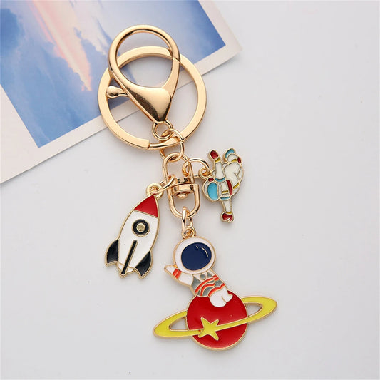 Creative Spaceman Rocket Keychain – Enamel Astronaut Pendant for Kids