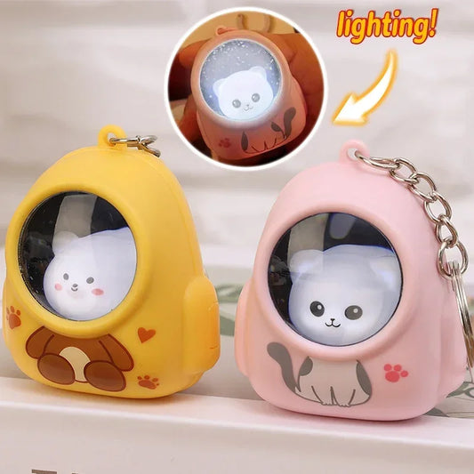 Glowing Cartoon Spaceman & Animal Keychain – Cute Luminous Couple Accessory