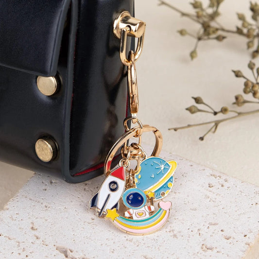 Creative Spaceman Rocket Keychain – Enamel Astronaut Pendant for Kids
