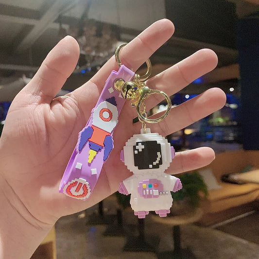 Cartoon Silicone Astronaut Keychain – Cute Spaceman & Rocket Bag Pendant