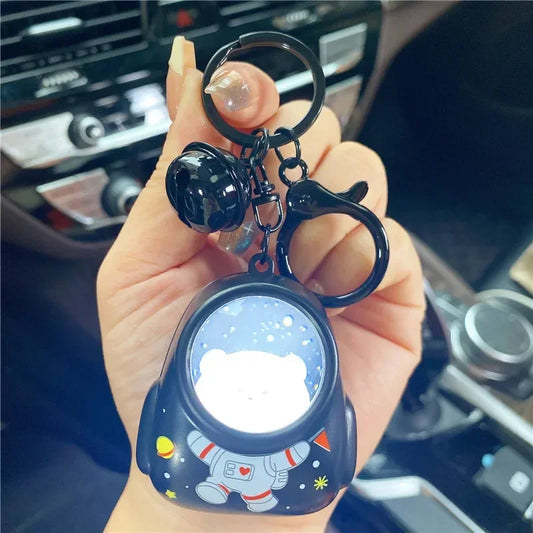 Glowing Cartoon Spaceman & Animal Keychain – Cute Luminous Couple Accessory